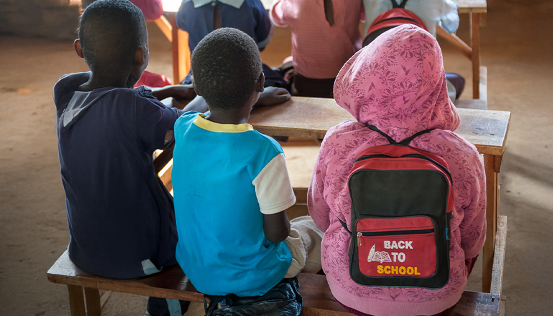 School children sitting at a table